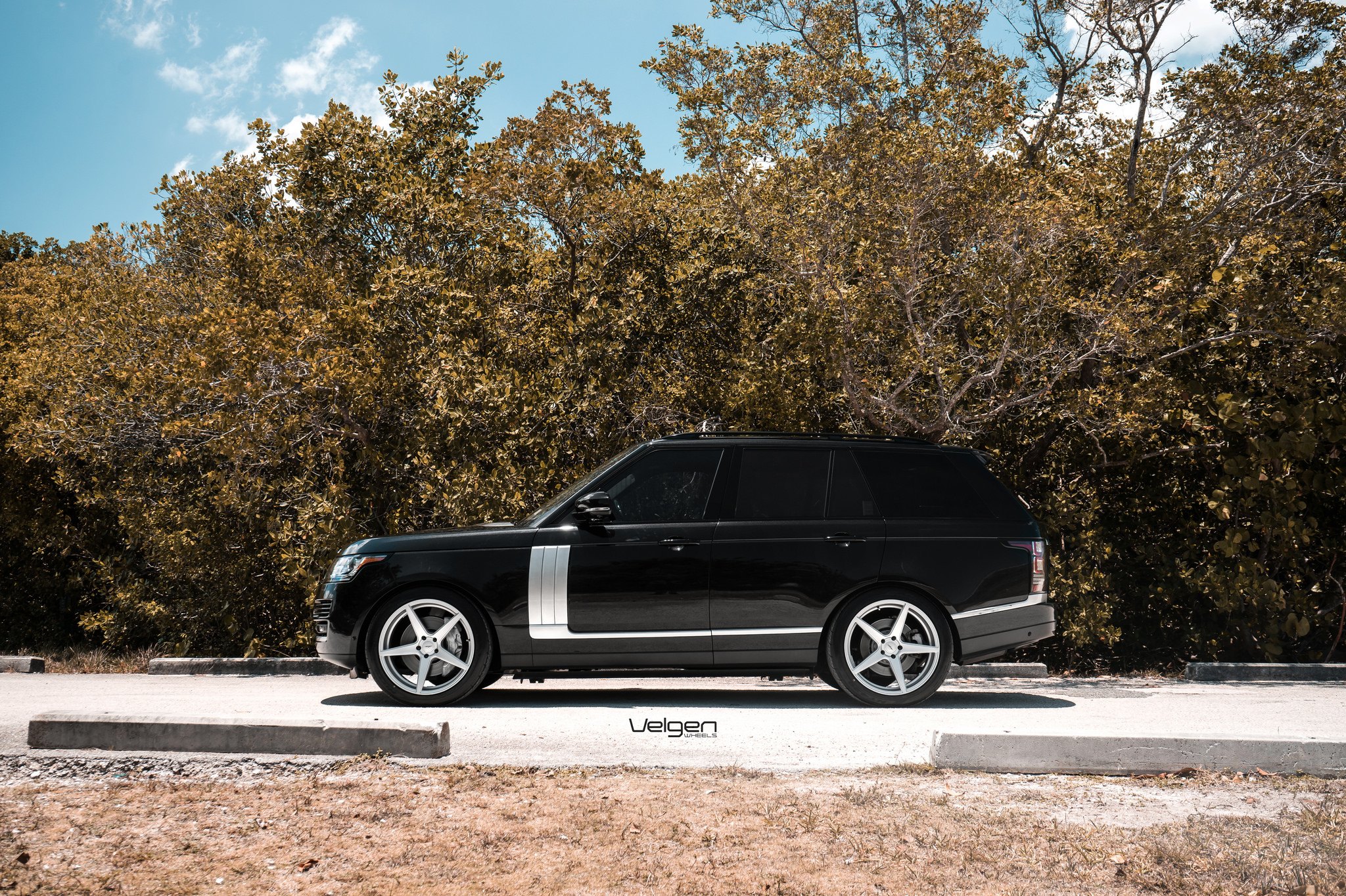 Custom Black Range Rover Chrome Bodyside Moldings - Photo by Velgen