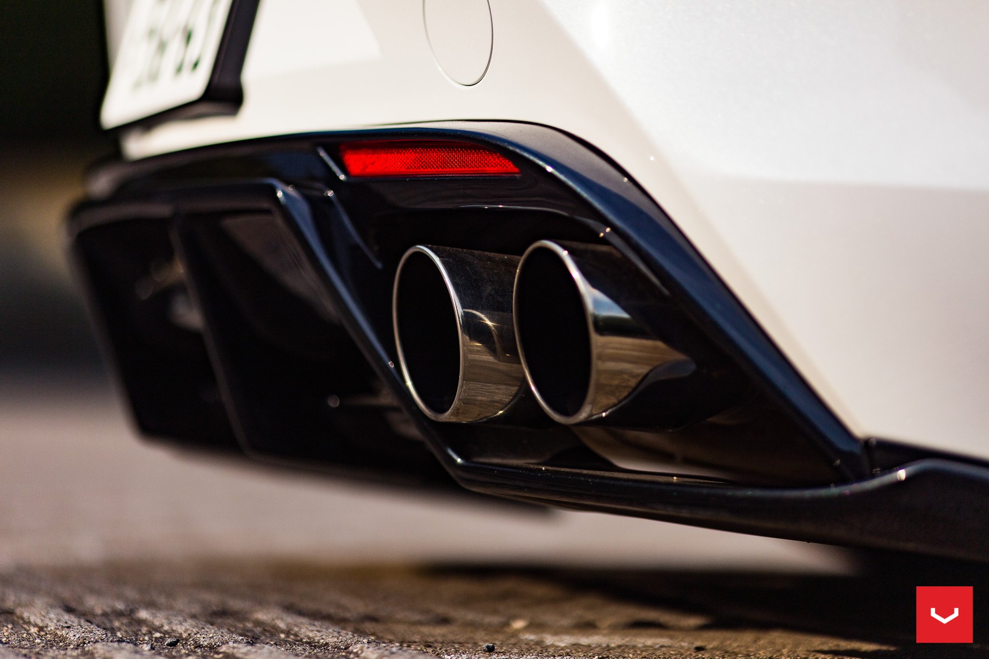 Rear Diffuser with Dual Exhaust Tips on Lexus LC - Photo by Vossen Wheels
