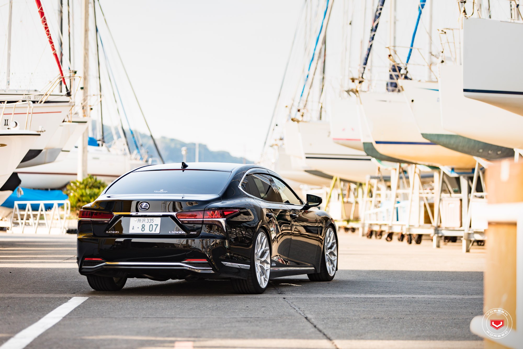 Red LED Taillights on Black Lexus LS  - Photo by Vossen Wheels