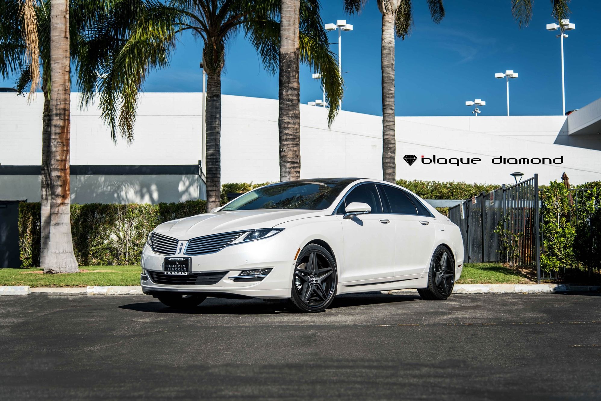 White Lincoln MKZ with Custom Chrome Grille - Photo by Blaque Diamond