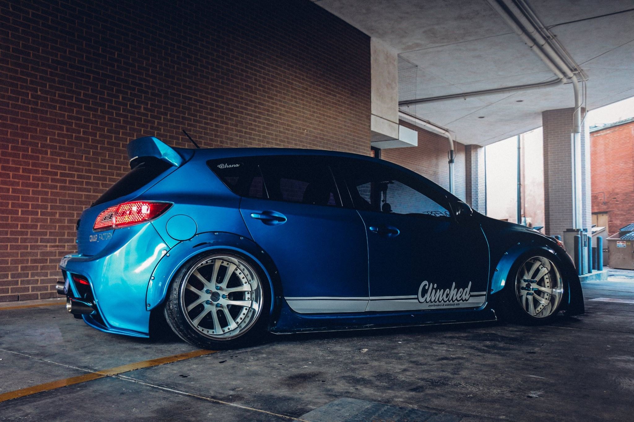 Aftermarket Fender Flares on Blue Mazda 3 - Photo by Clinched