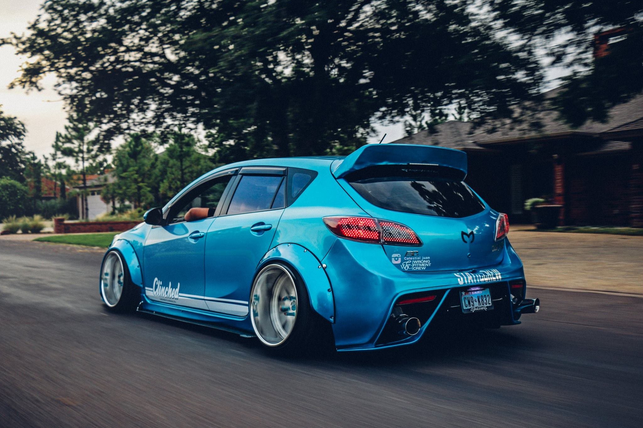Blue Debadged Mazda 3 with Custom Rear Diffuser - Photo by Clinched