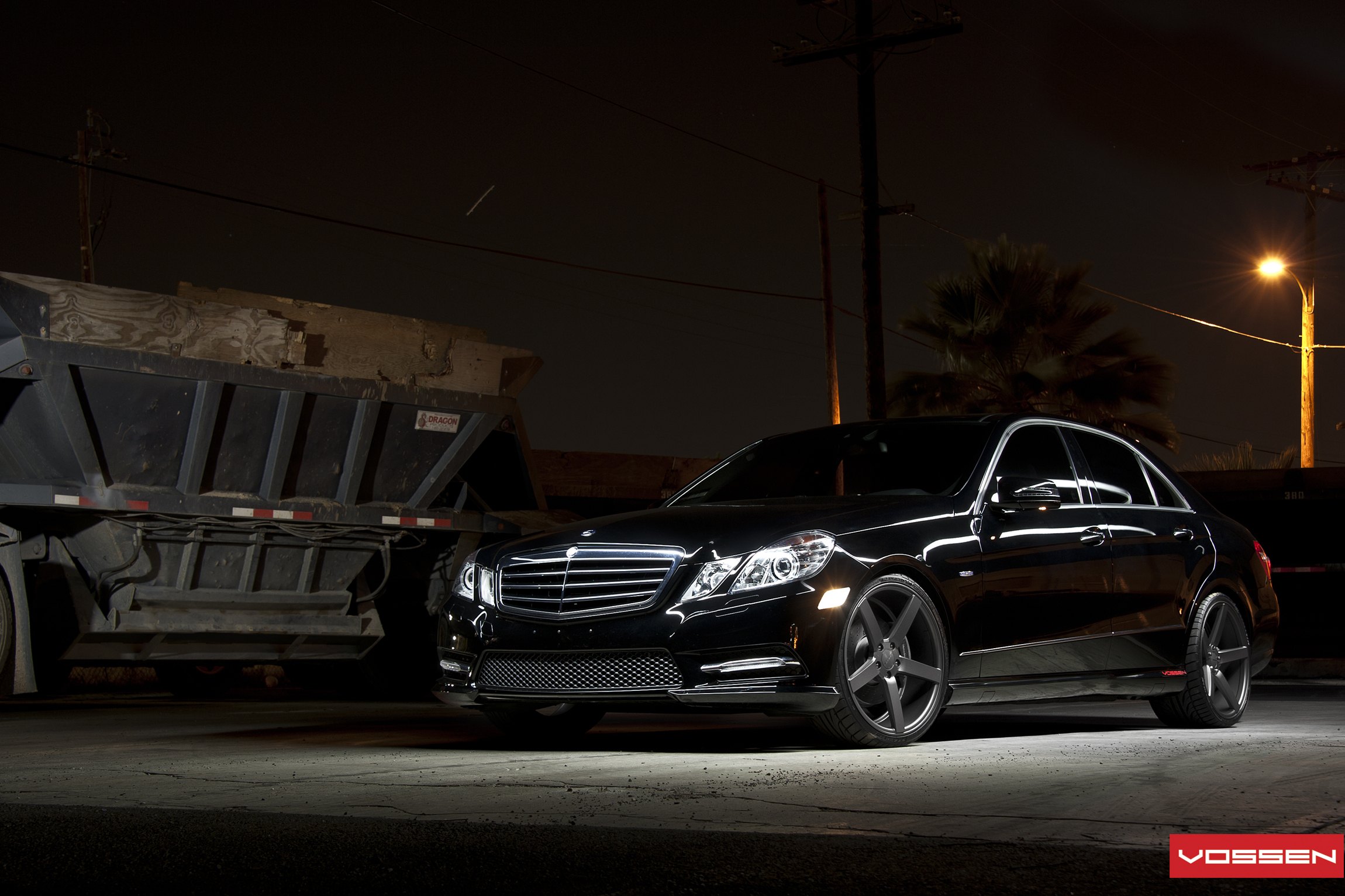 Custom Projector Headlights on Black Mercedes E Class - Photo by Vossen