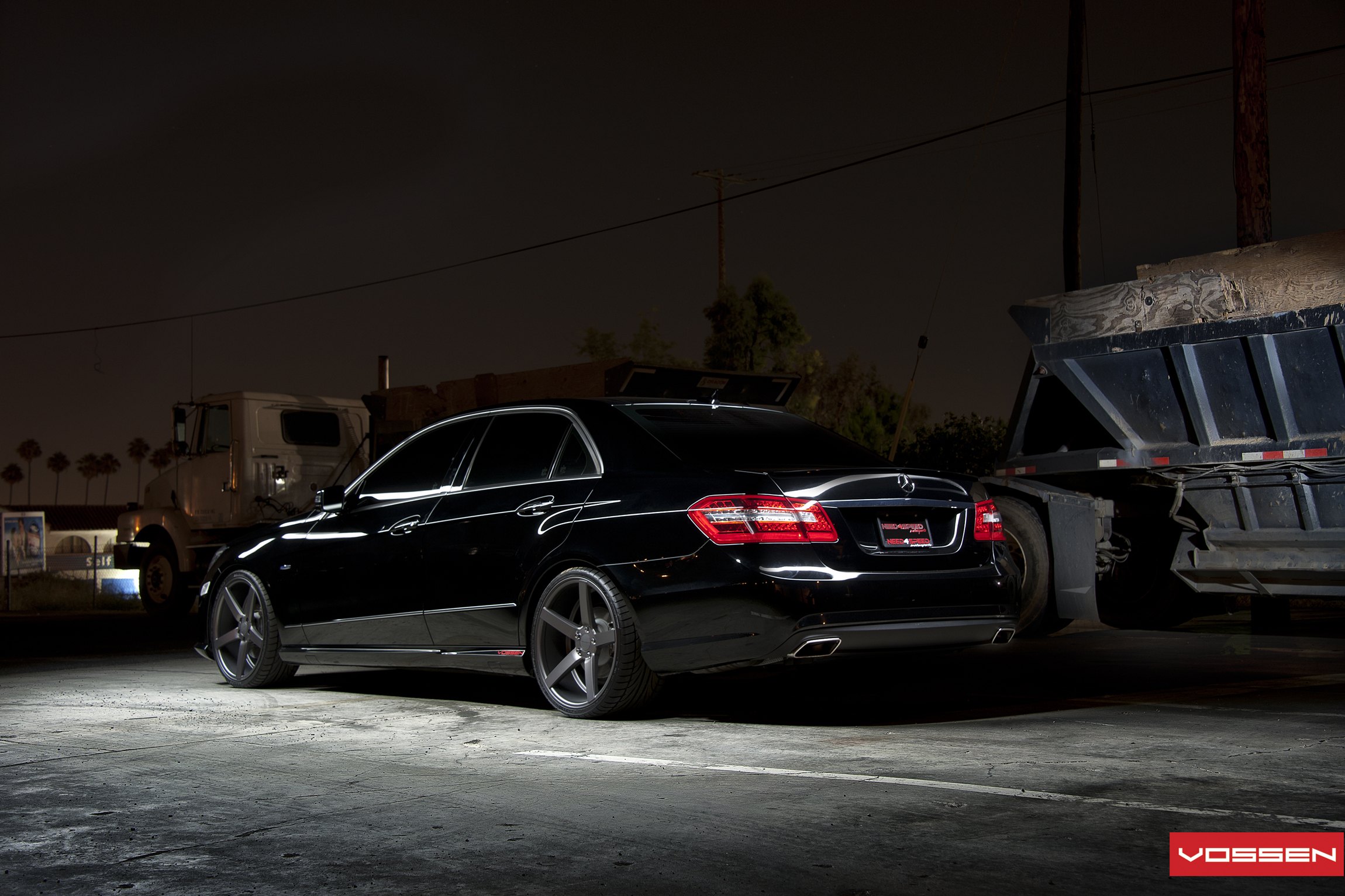 Aftermarket Red LED Taillights on Black Mercedes E Class - Photo by Vossen