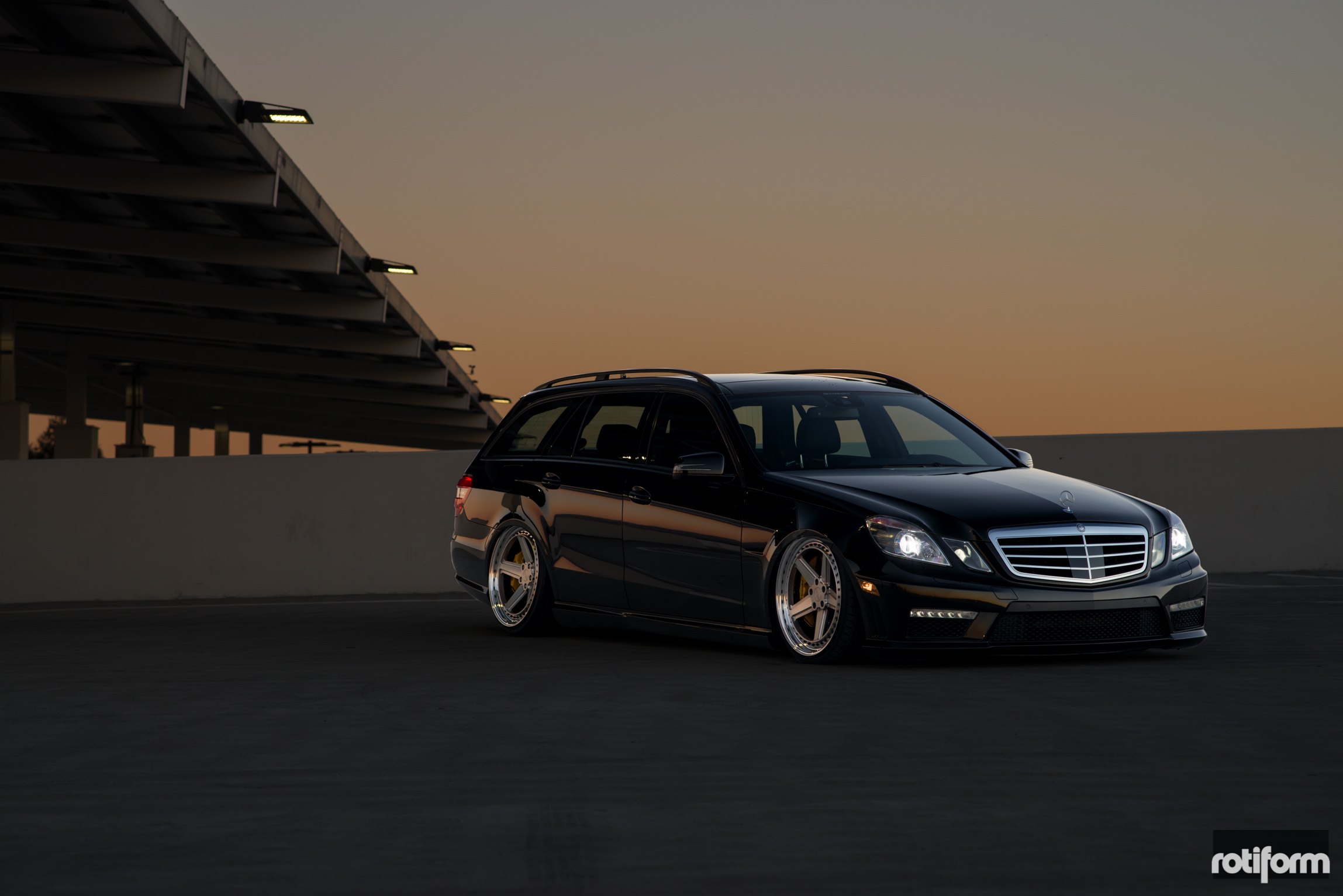 Black Slammed Mercedes E Class with Chrome Grille - Photo by Rotiform