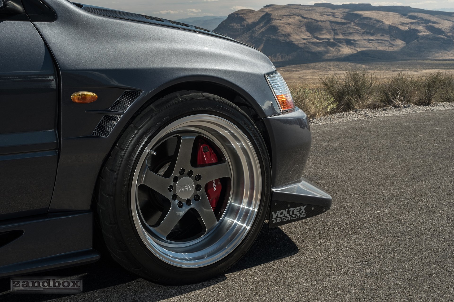 Chrome Rims with Brembo Brakes on Gray Mitsubishi Evolution - Photo by zandbox