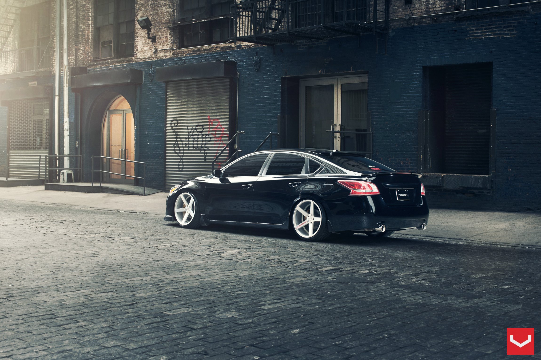 Black Nissan Altima with Custom Taillights - Photo by Vossen