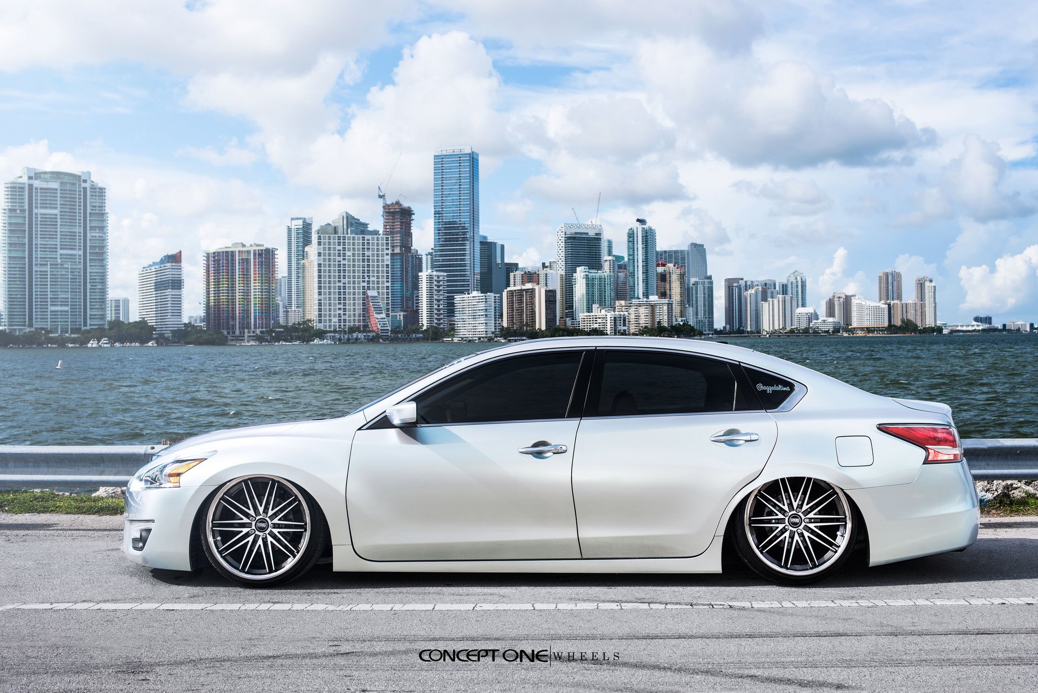 White Nissan Altima with Aftermarket Side Skirts - Photo by Concept One