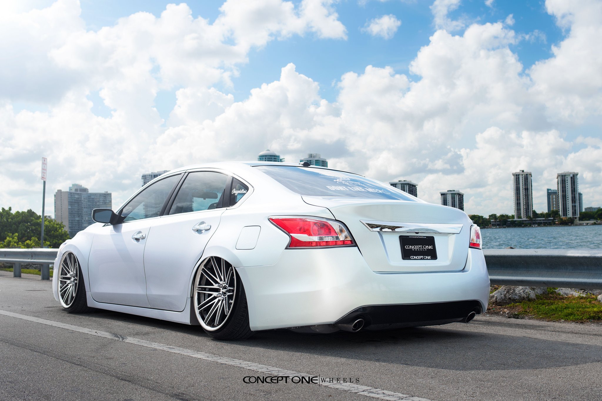 Custom Rear Diffuser on White Nissan Altima - Photo by Concept One