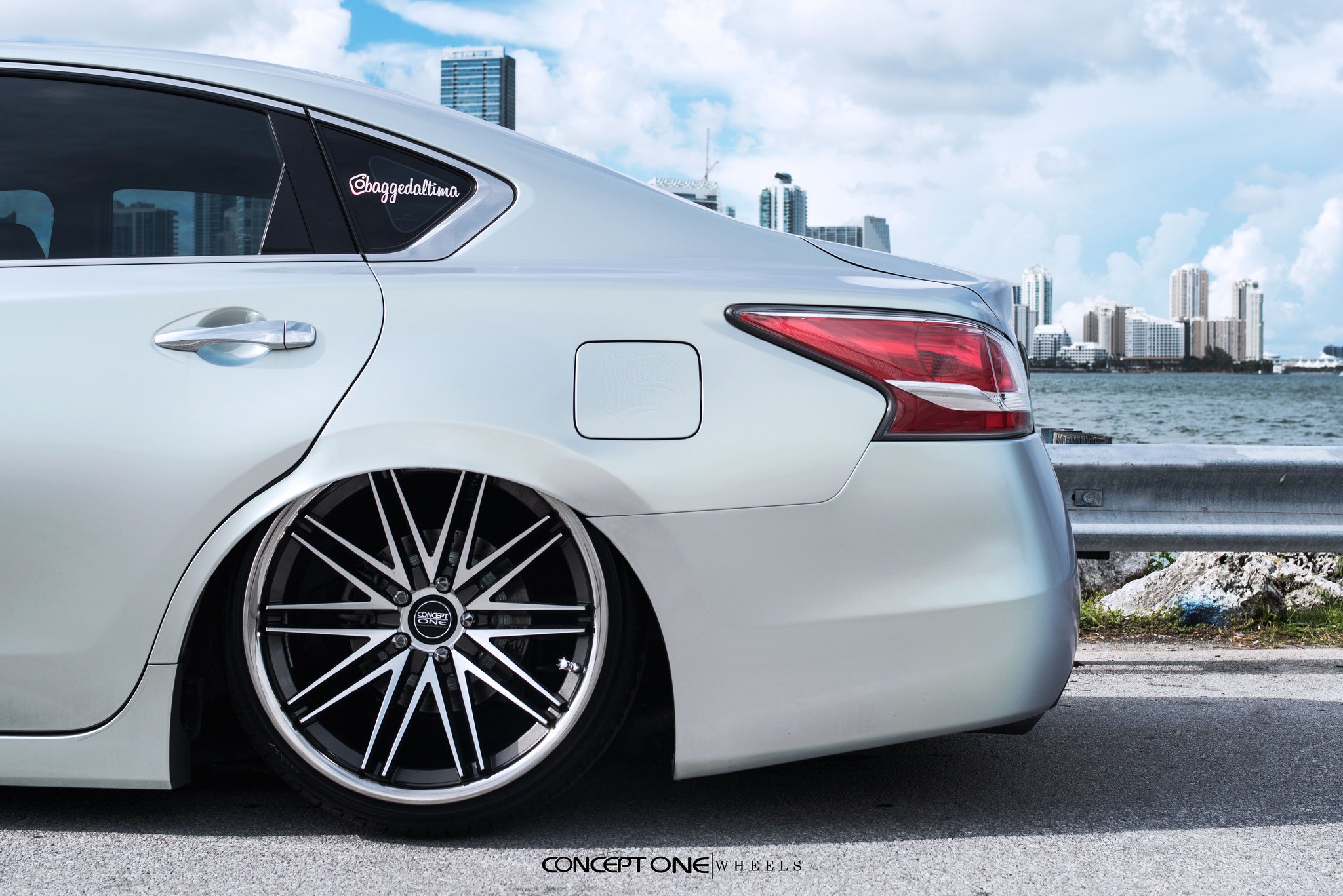 White Nissan Altima with Polished Concept One Rims - Photo by Concept One
