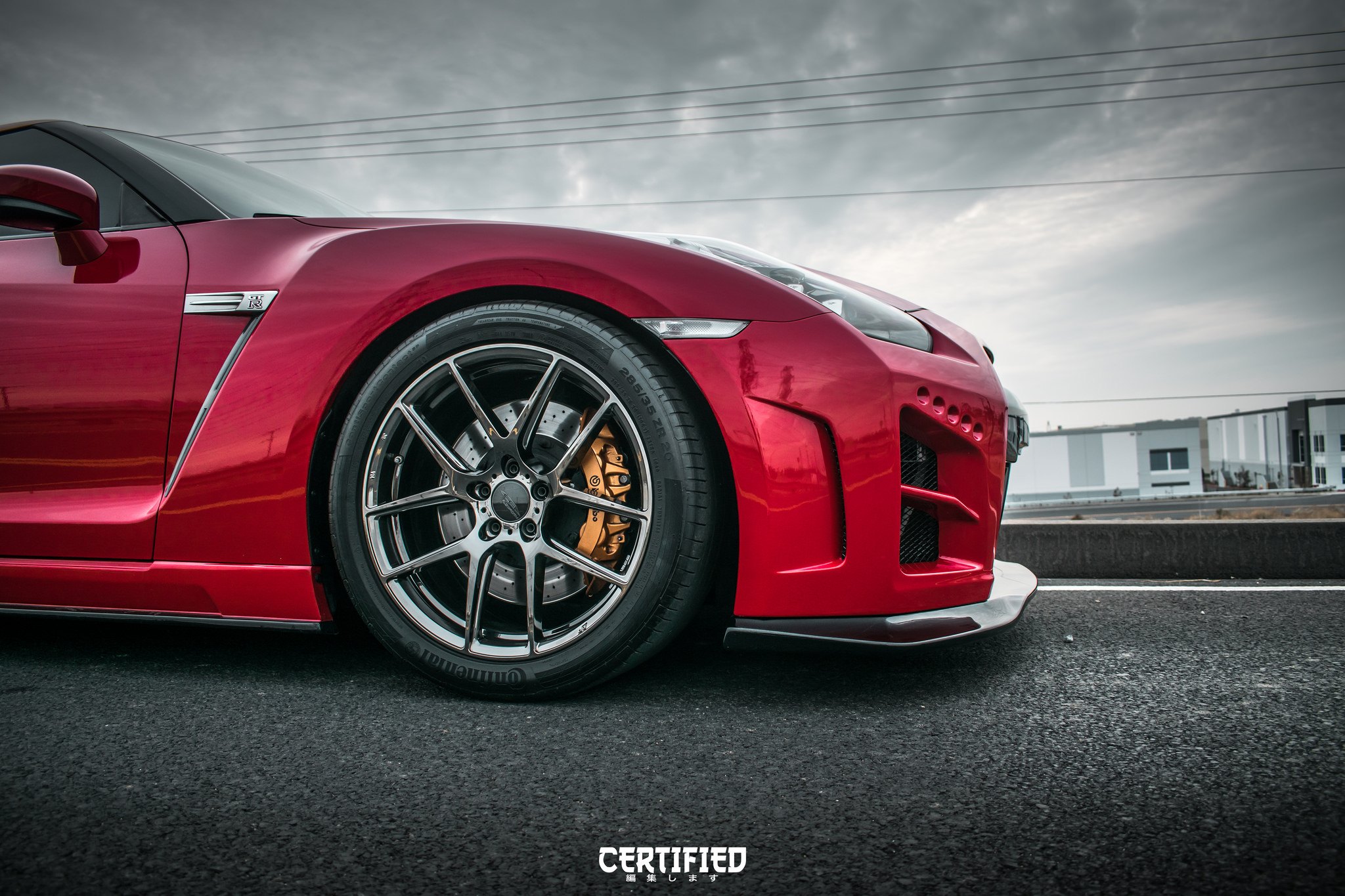 Red Nissan GT-R with Gunmetal Ace Alloy Rims - Photo by Ace Alloy Wheels