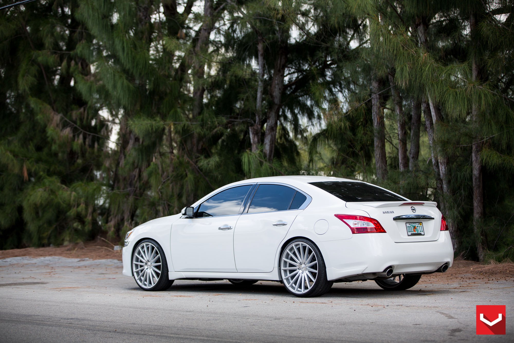 White Rear Spoiler with Light on Nissan Maxima - Photo by Vossen
