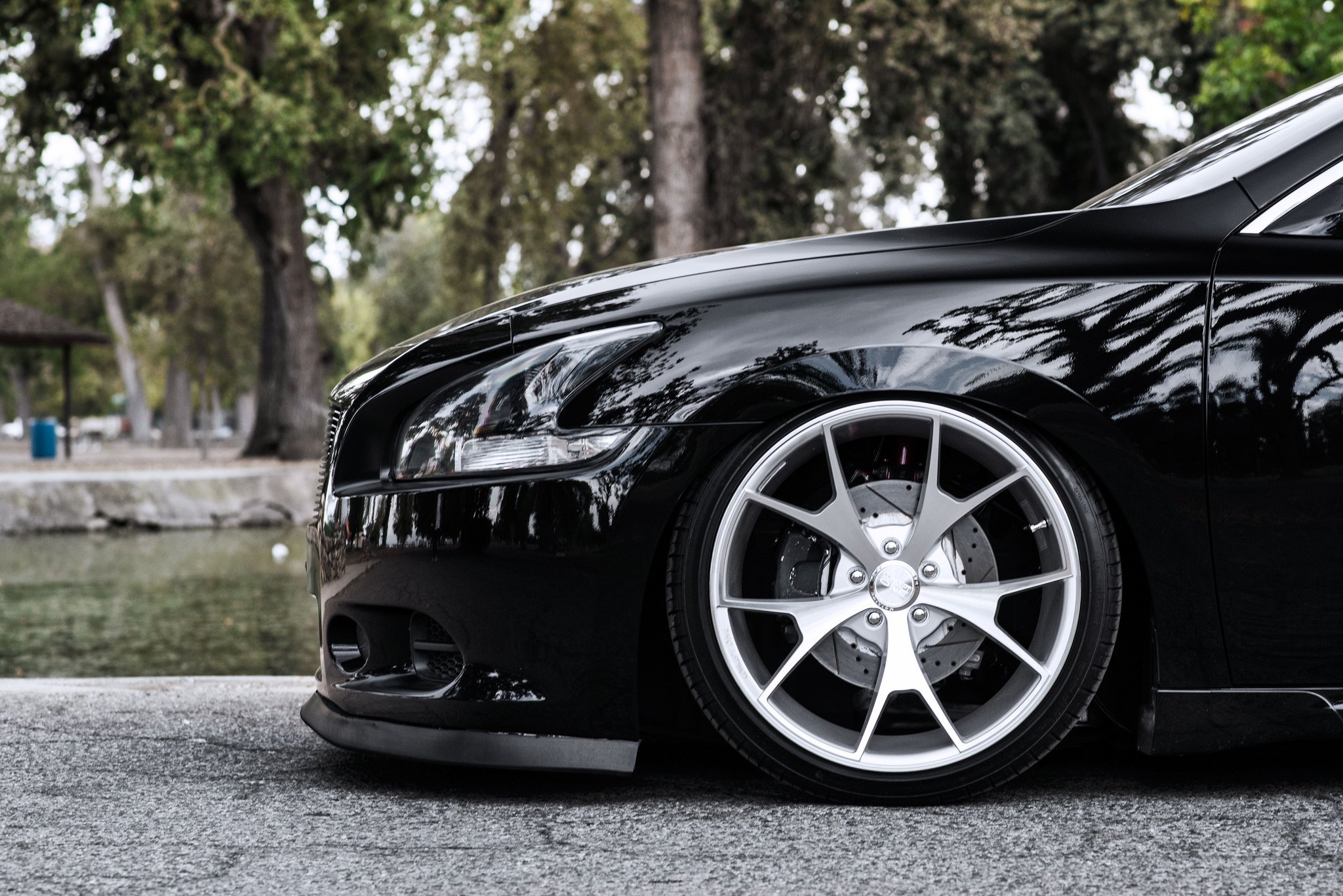 Black Nissan Maxima with Custom Front Bumper - Photo by Concept One