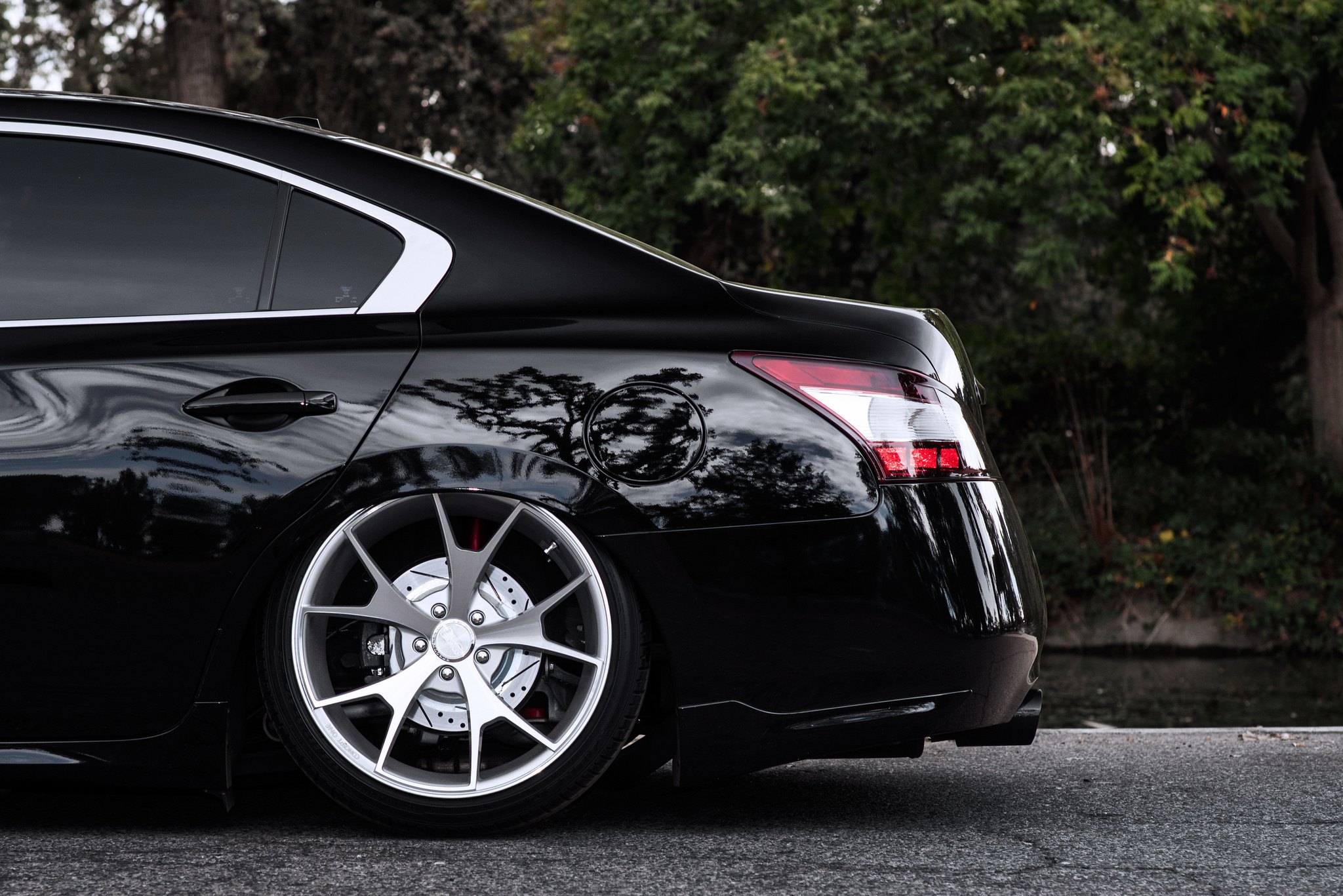 Chrome Concept One Wheels on Black Nissan Maxima - Photo by Concept One