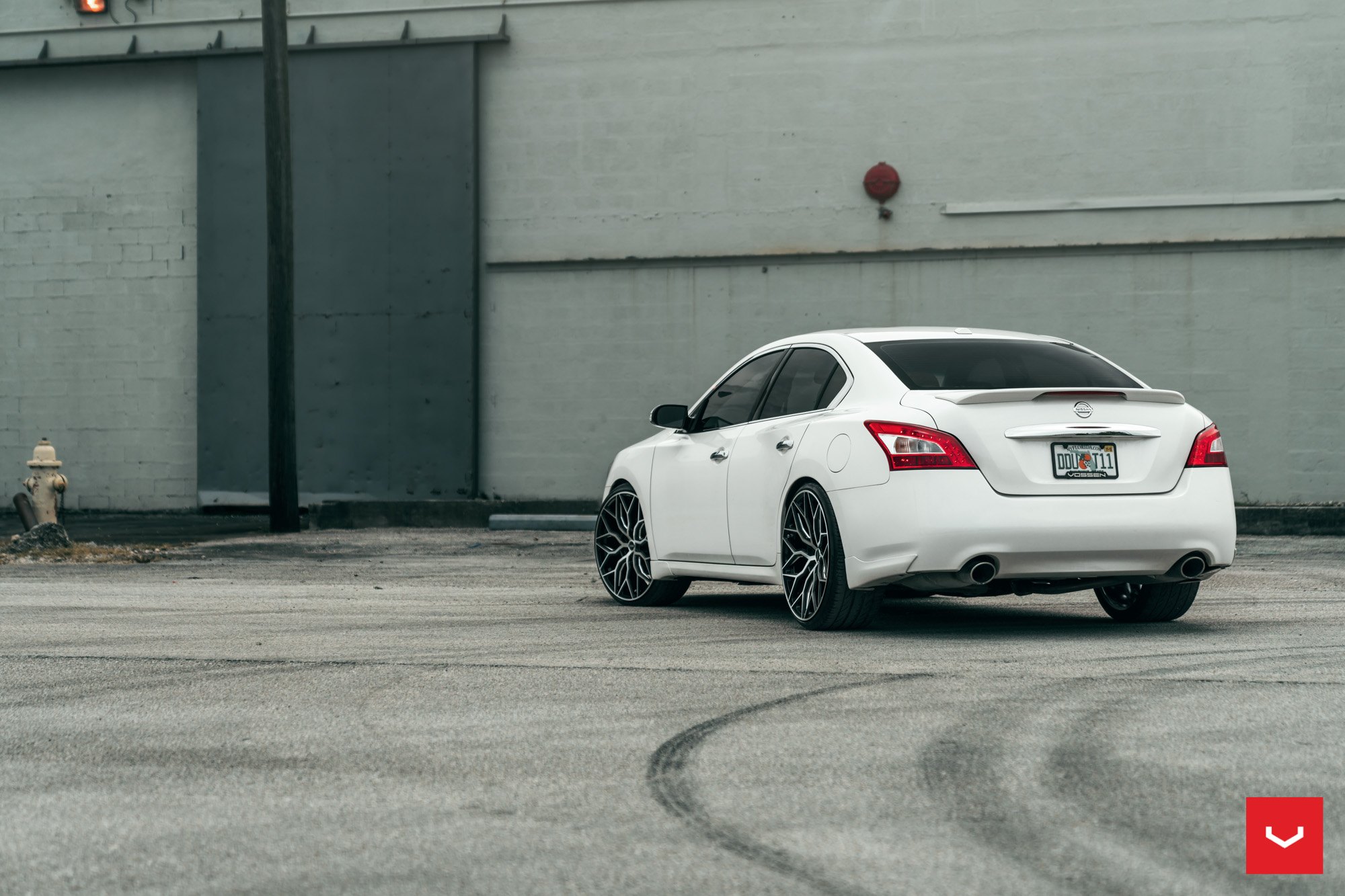 Rear Spoiler with Light on White Nissan Maxima - Photo by Vossen