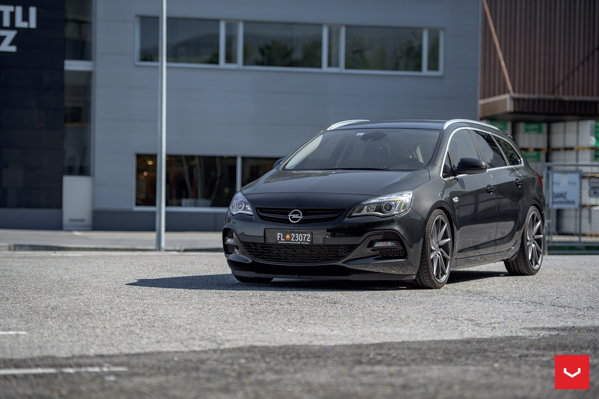 Custom Headlights on Black Opel Astra - Photo by Vossen