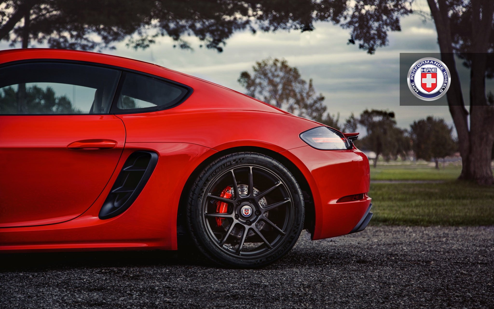 Custom Red Porsche Cayman GT3 on Michelin Tires - Photo by HRE Wheels
