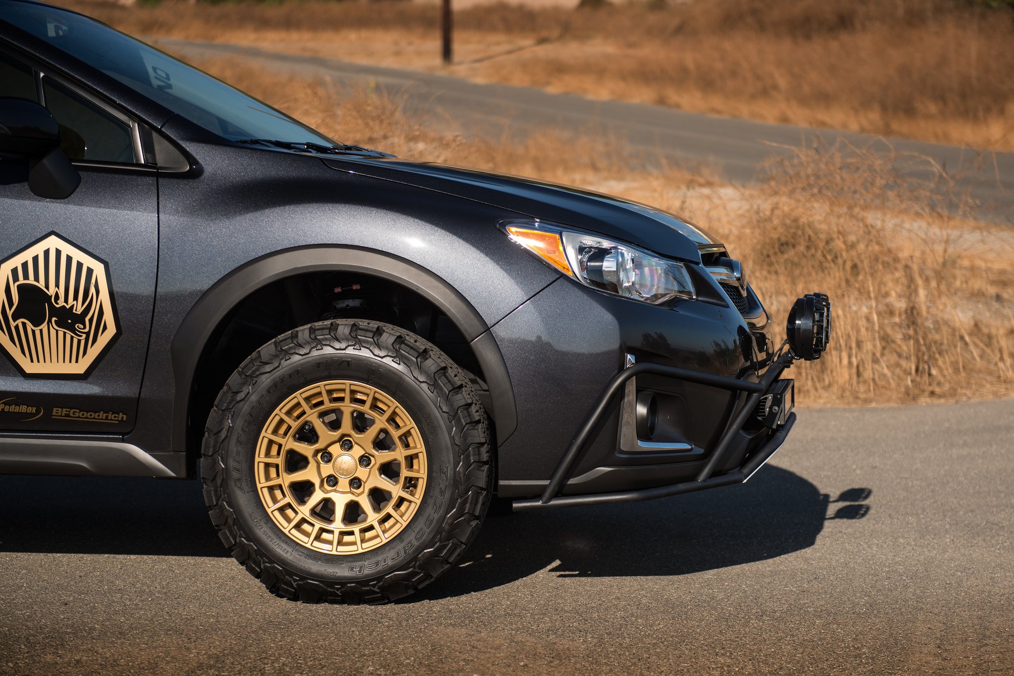 Black Subaru Crosstrek with Matte Gold Black Rhino Rims - Photo by Black Rhino