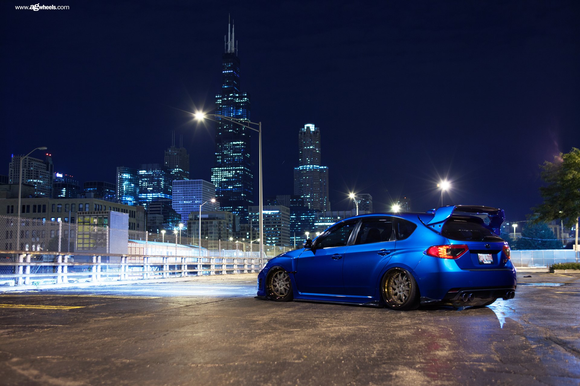 Blue Subaru WRX with Large Roofline Spoiler - Photo by Avant Garde Wheels