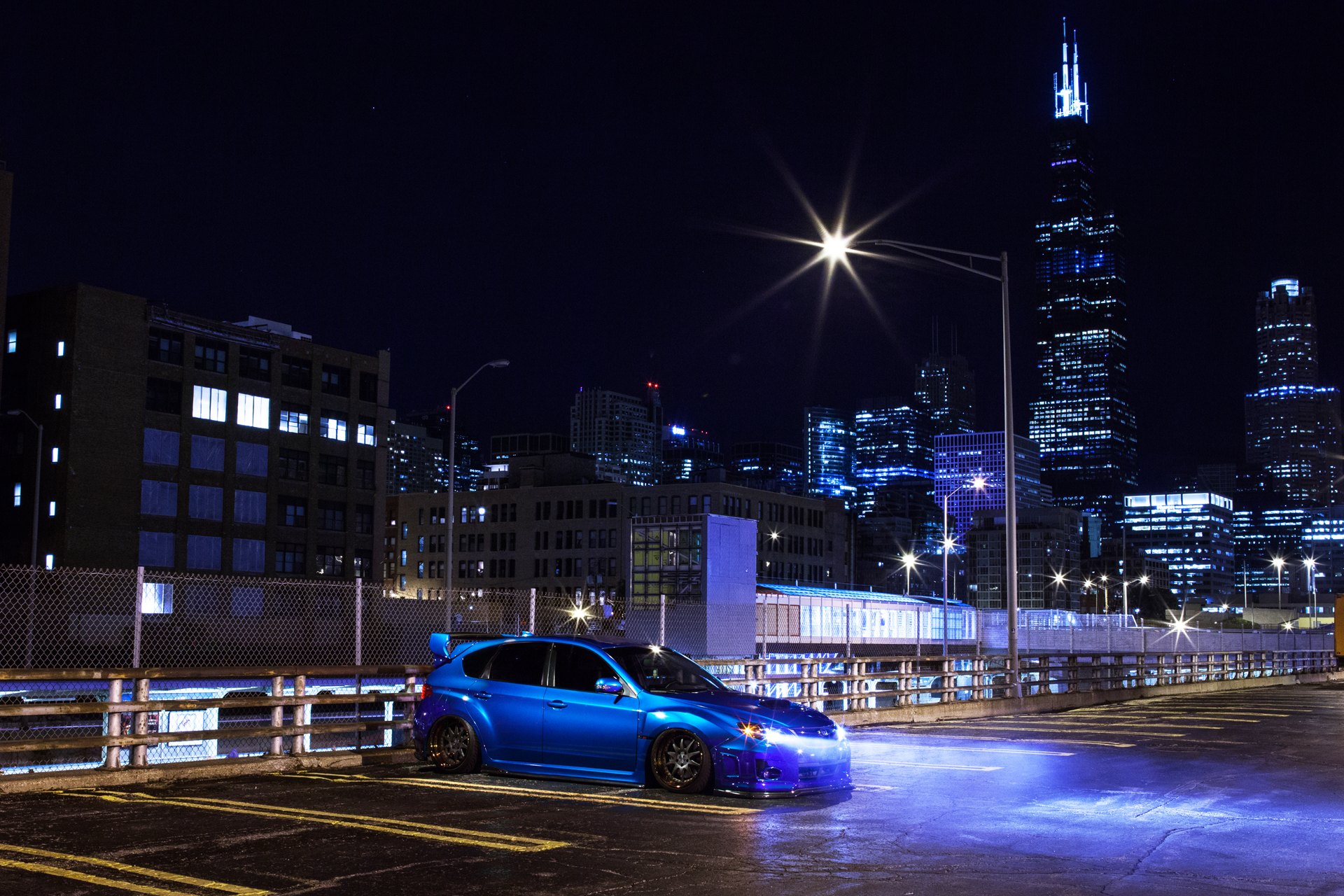 Aftermarket Projector Headlights on Blue Subaru WRX - Photo by Avant Garde Wheels