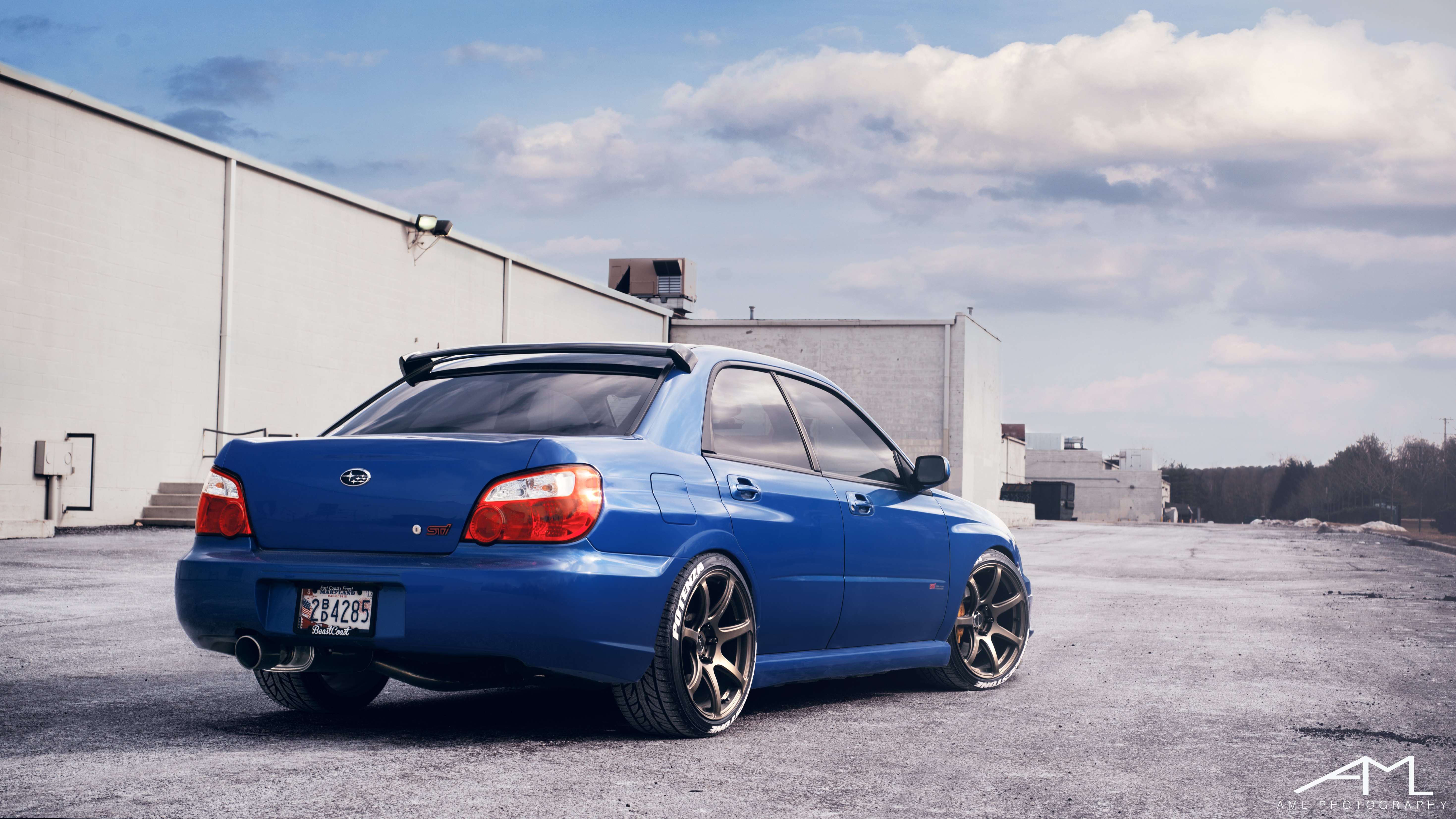 Blue Subaru WRX STI with Custom Exhaust System - Photo by Arlen Liverman