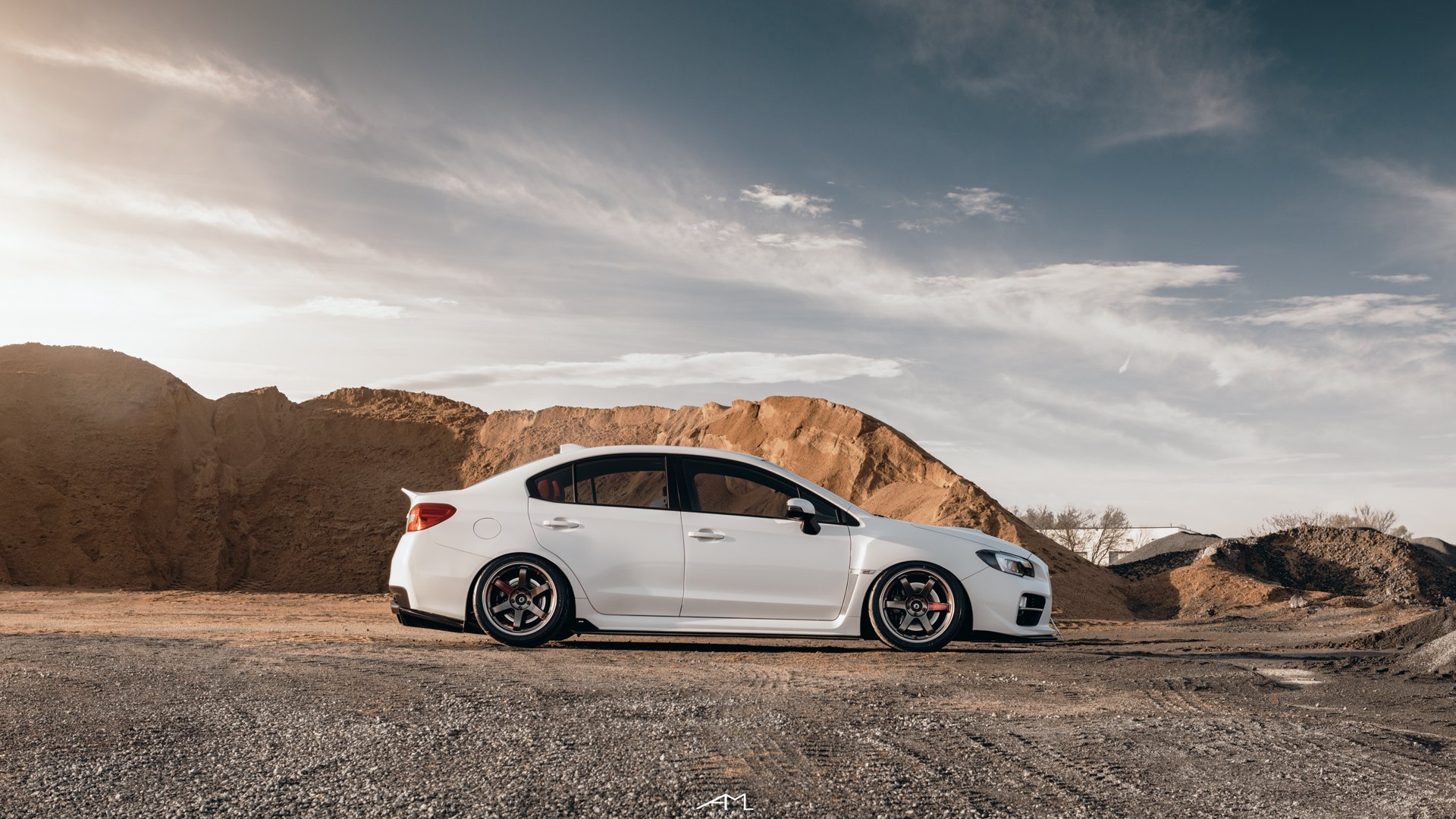 White Subaru WRX with Custom Wheels - Photo by Arlen Liverman