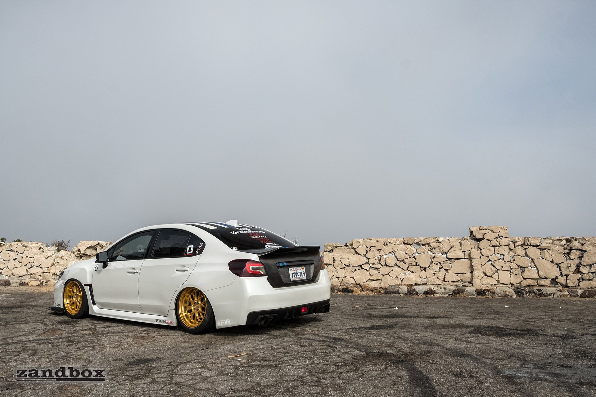 White Subaru WRX with Red Clear LED Taillights  - Photo by zandbox