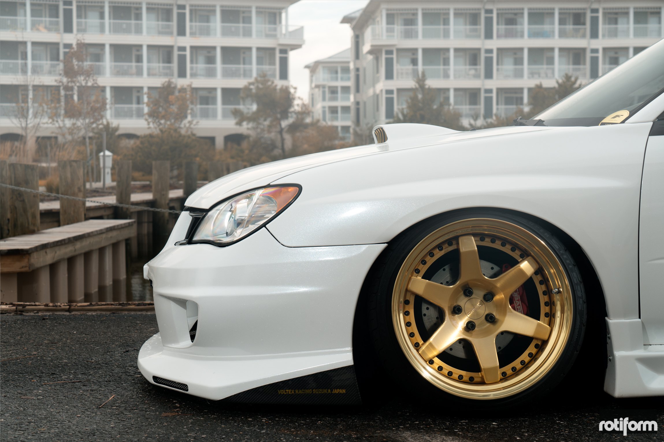 White Lowered Subaru WRX with Candy Gold Rotiform Wheels - Photo by Rotiform