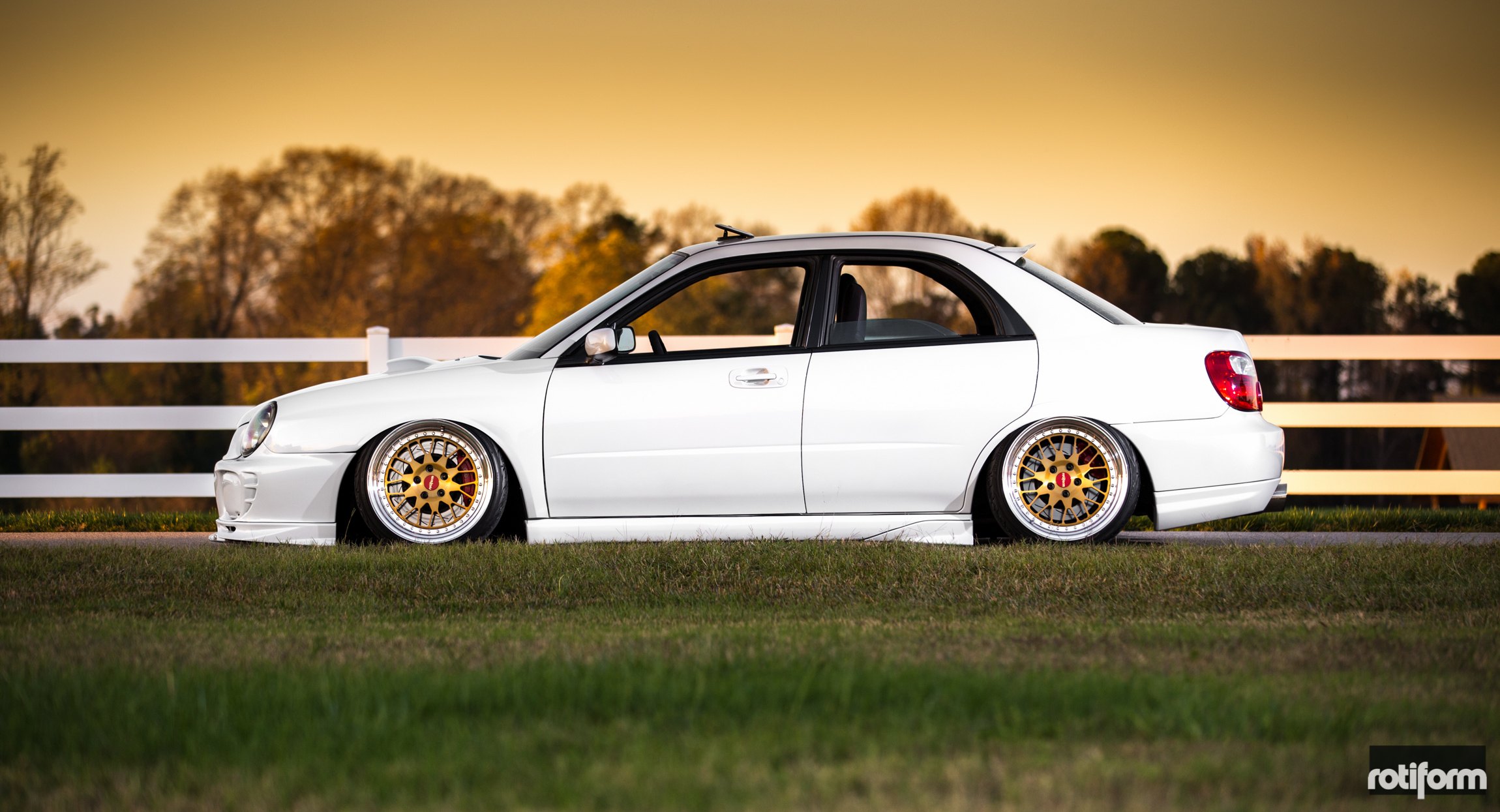 Brushed Candy Gold Rotiform Wheels on White Subaru WRX - Photo by Rotiform