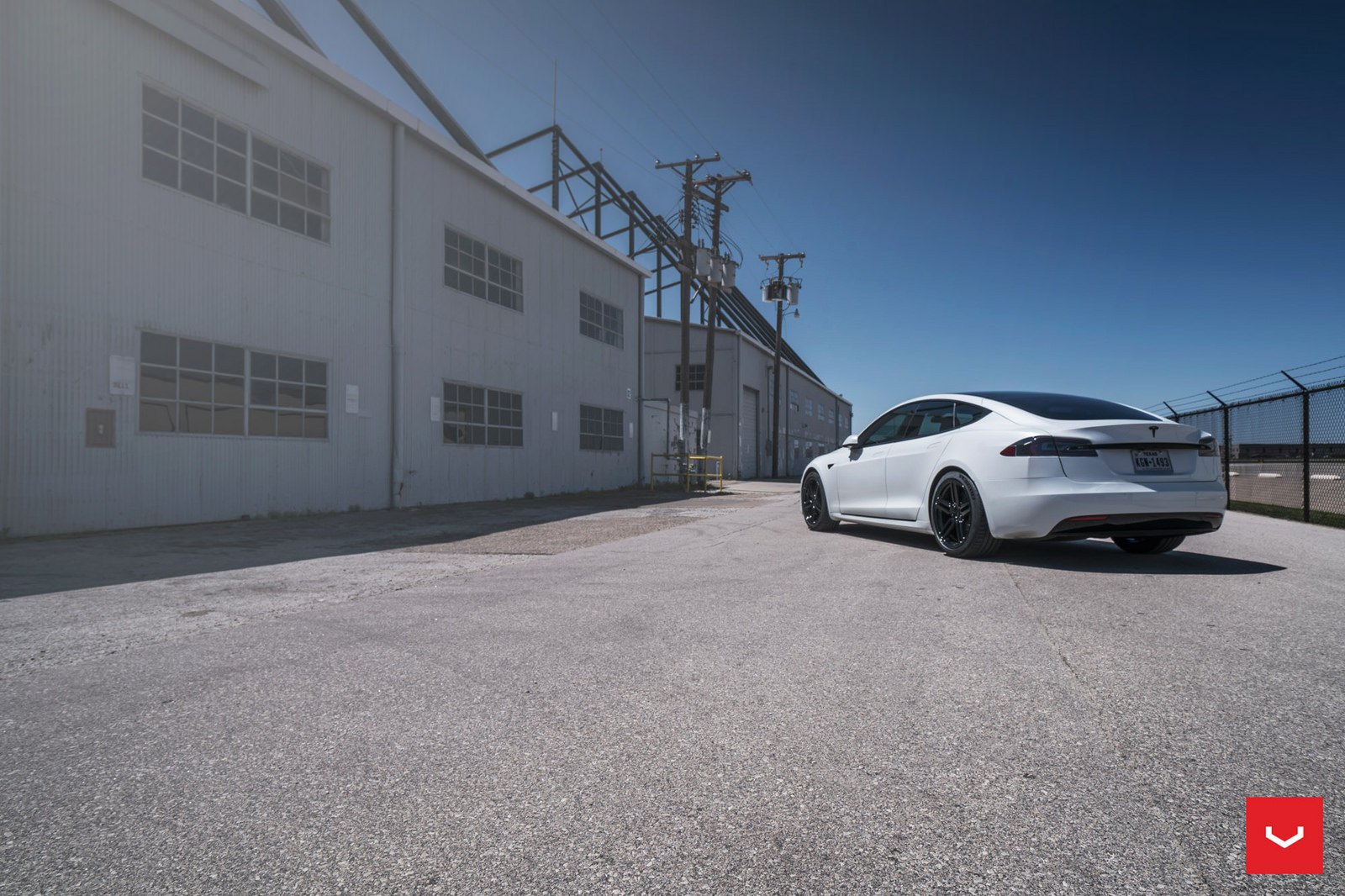White Tesla Model S with Red Smoke Taillights - Photo by Vossen