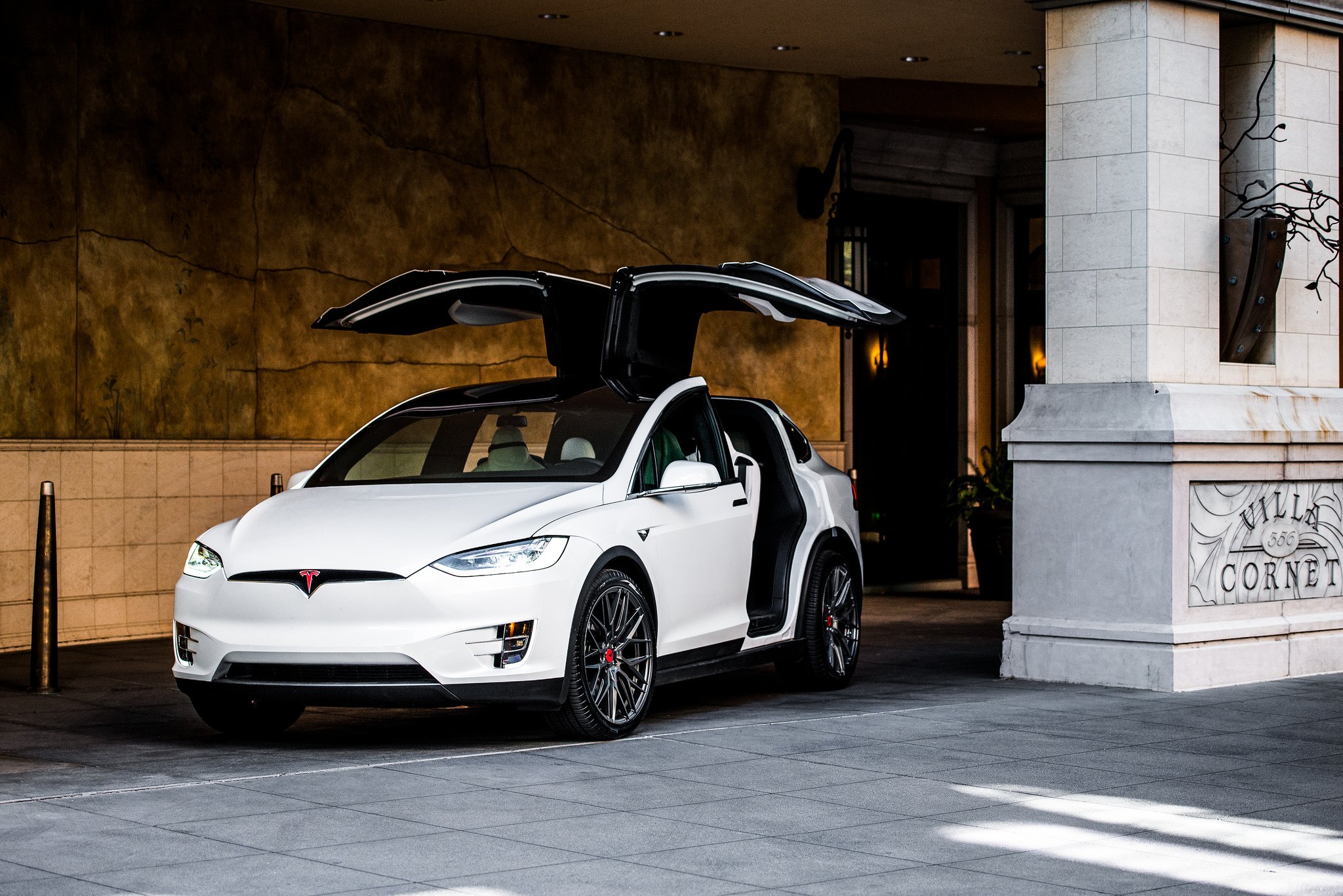White Tesla Model X with Custom Vertical Doors - Photo by Vorsteiner