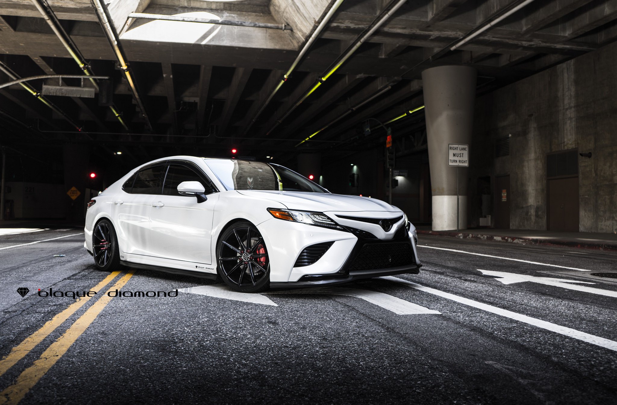 White Toyota Camry with Carbon Fiber Front Lip - Photo by Blaque Diamond Wheels