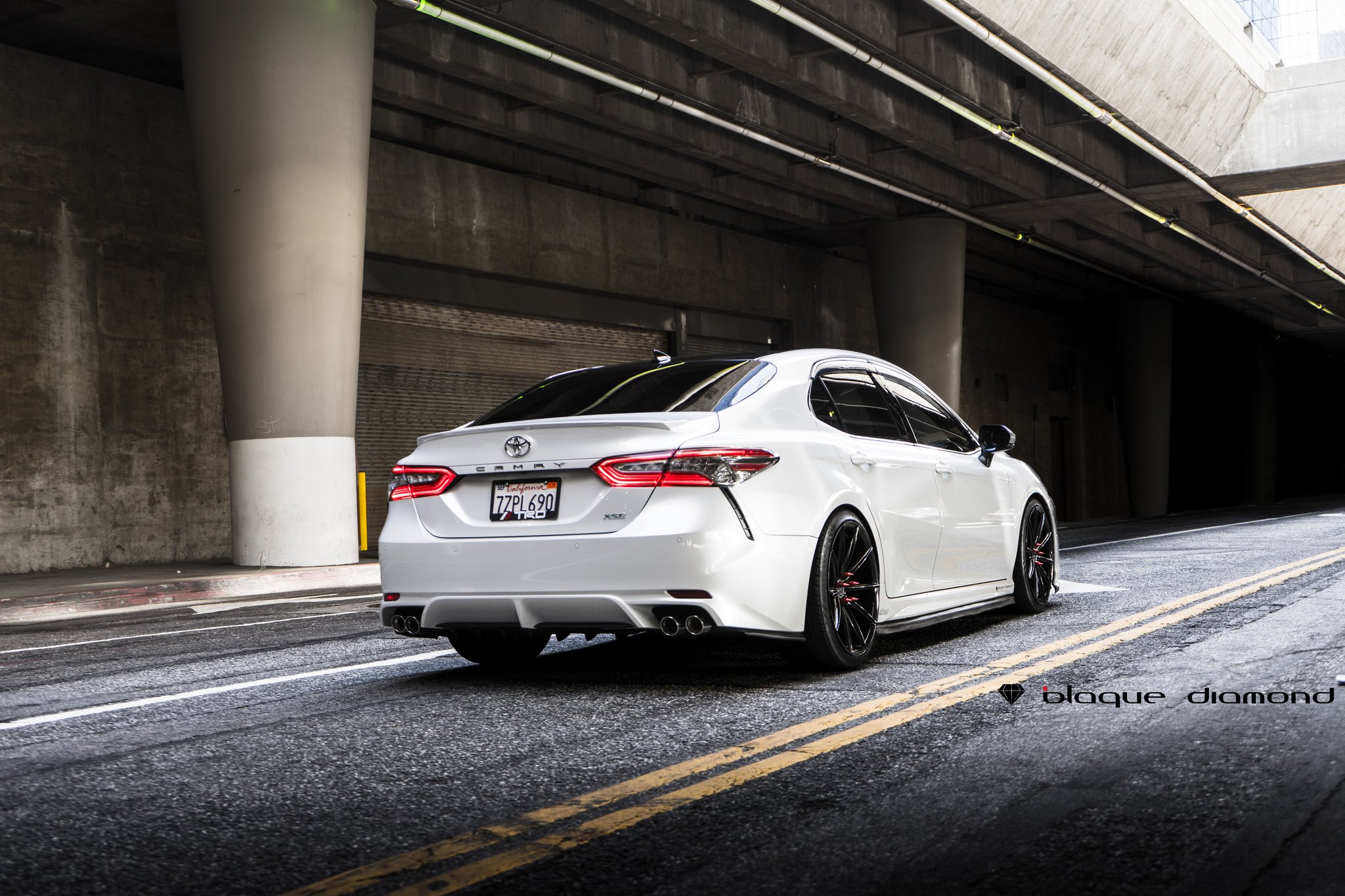 Aftermarket Rear Diffuser on White Toyota Camry - Photo by Blaque Diamond Wheels