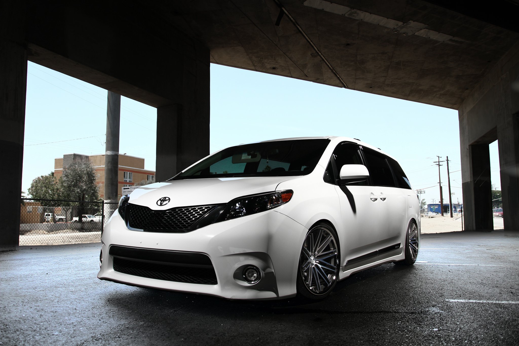 White Lowered Toyota Sienna with Blacked Out Grille - Photo by Concept One
