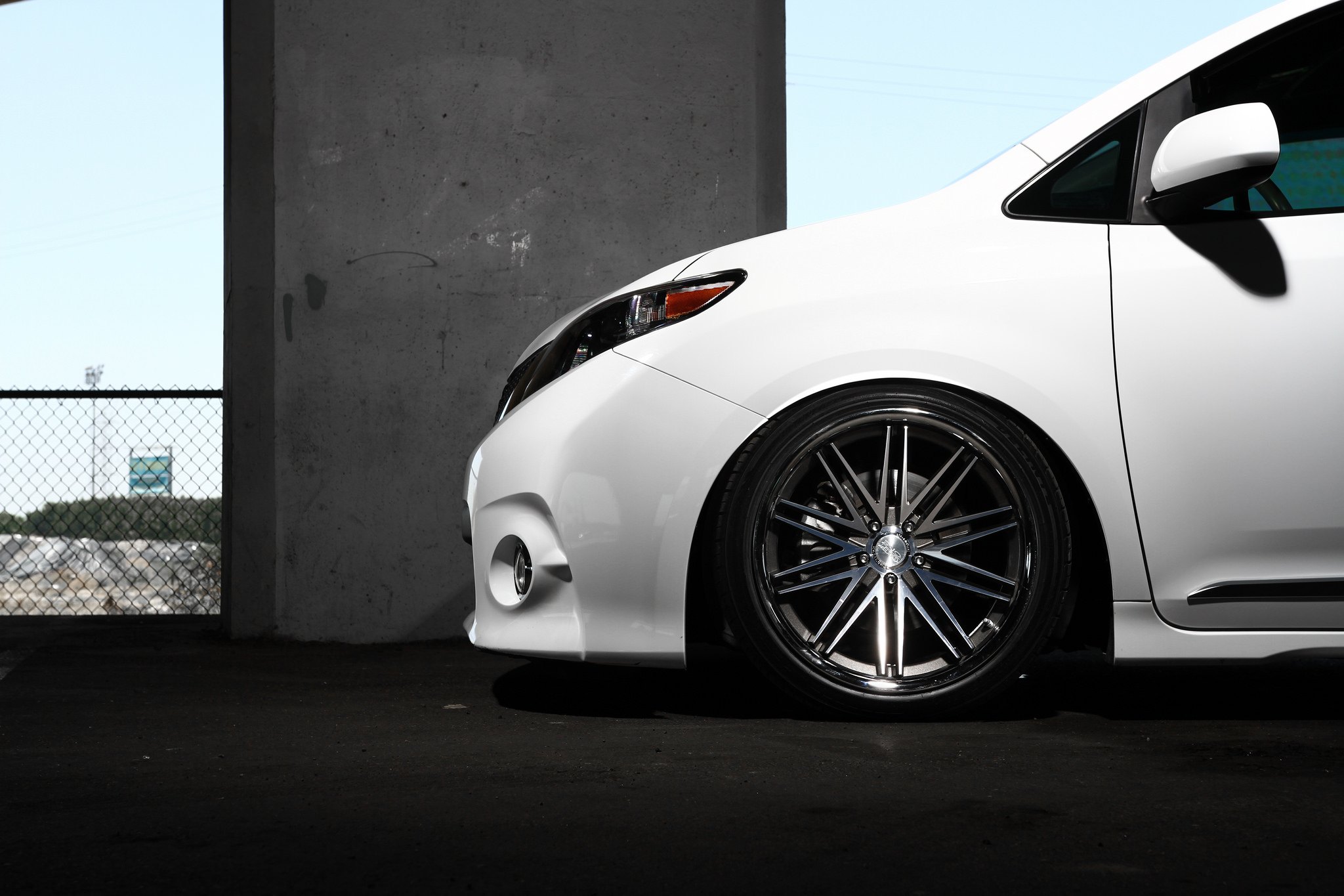 White Toyota Sienna with Aftermarket Front Bumper - Photo by Concept One