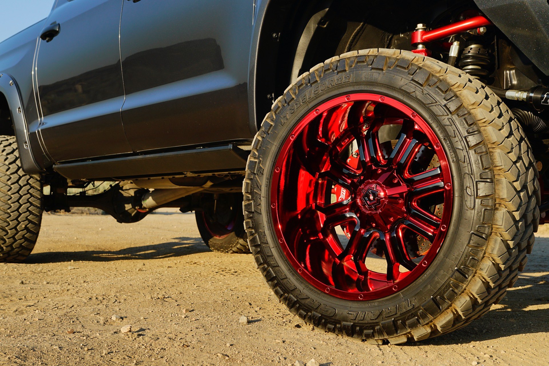 Black Lifted Toyota Tundra with Red Forged TIS Wheels - Photo by TIS Wheels