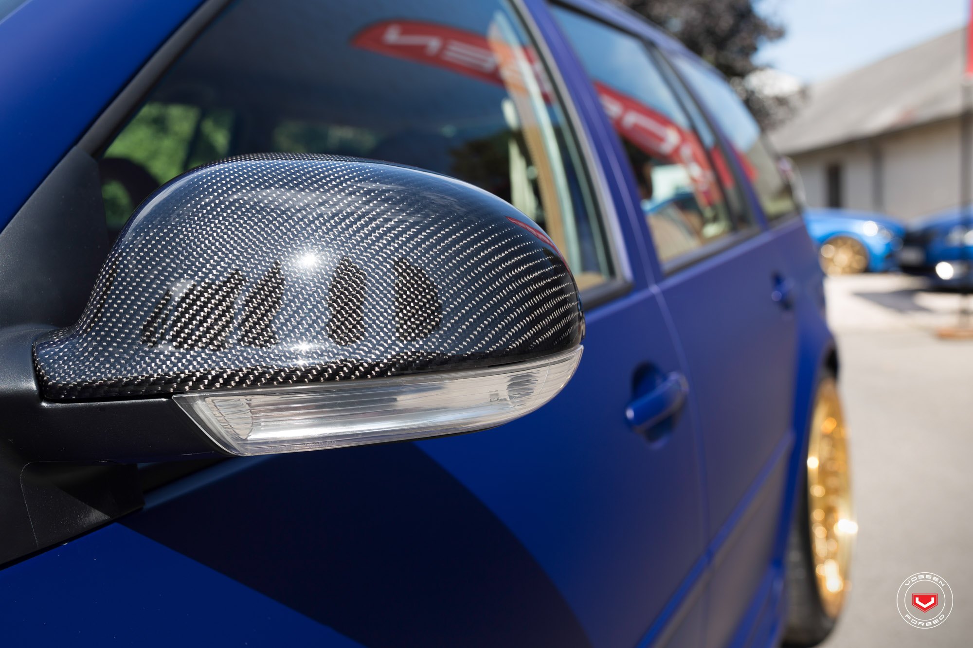 Carbon Fiber Side Mirrors on Matte Blue VW Jetta - Photo by Vossen