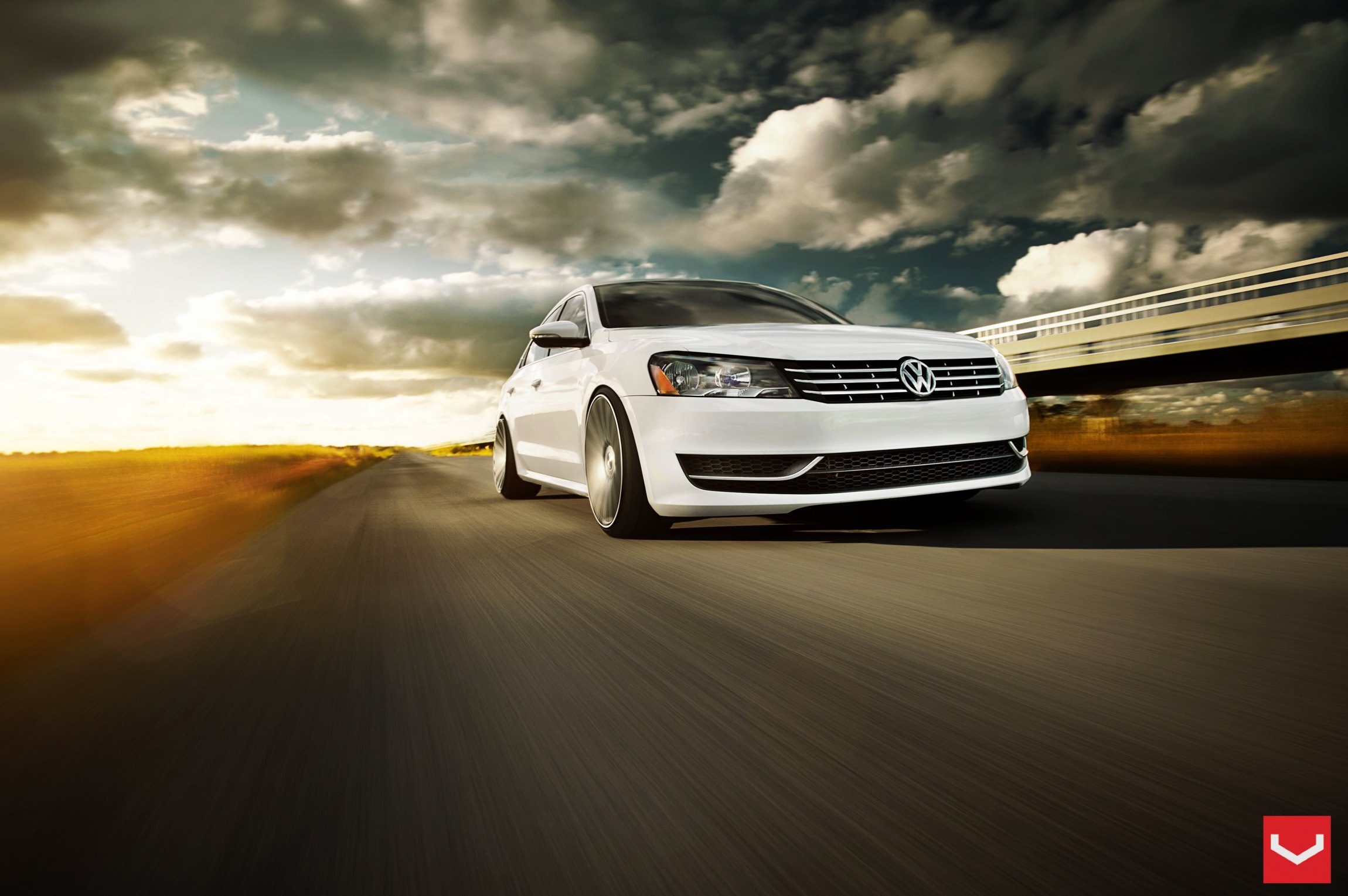 White VW Passat with Chrome Grille - Photo by Vossen